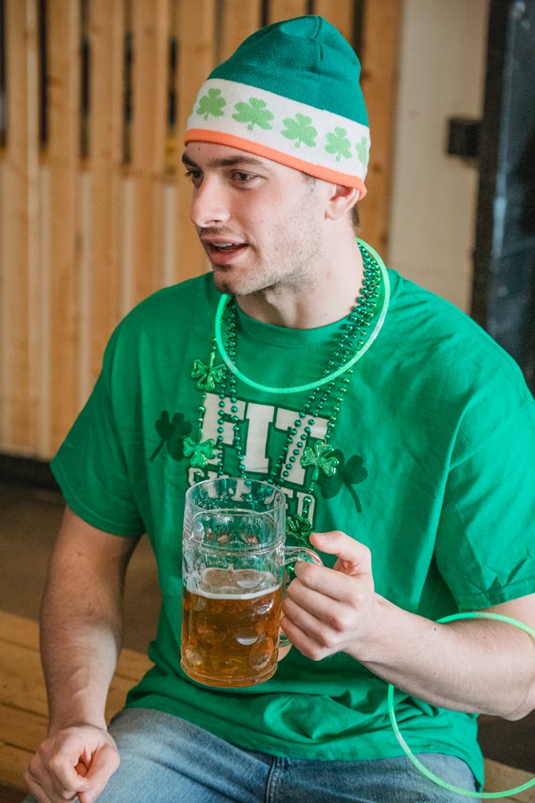 Cool Man With Mug Of Beer On Bench