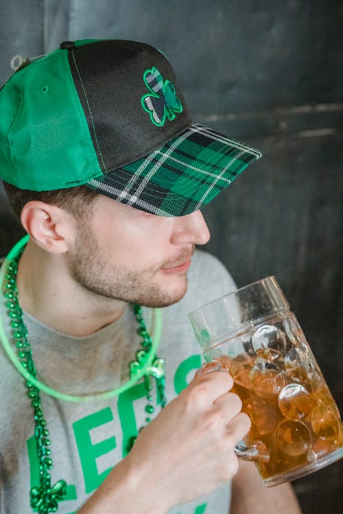 Man with mug of beer on Saint Patricks Day