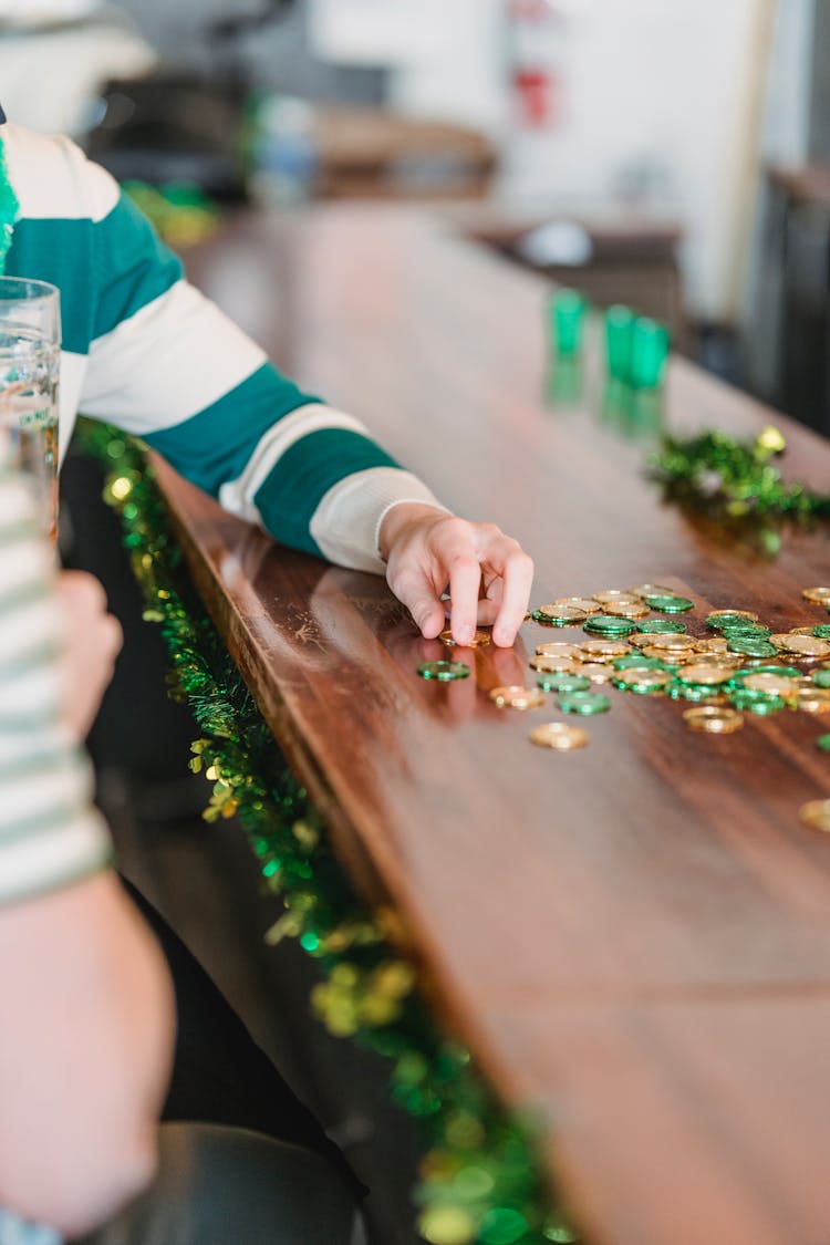 Man Touching St Patricks Day Green And Golden Coins