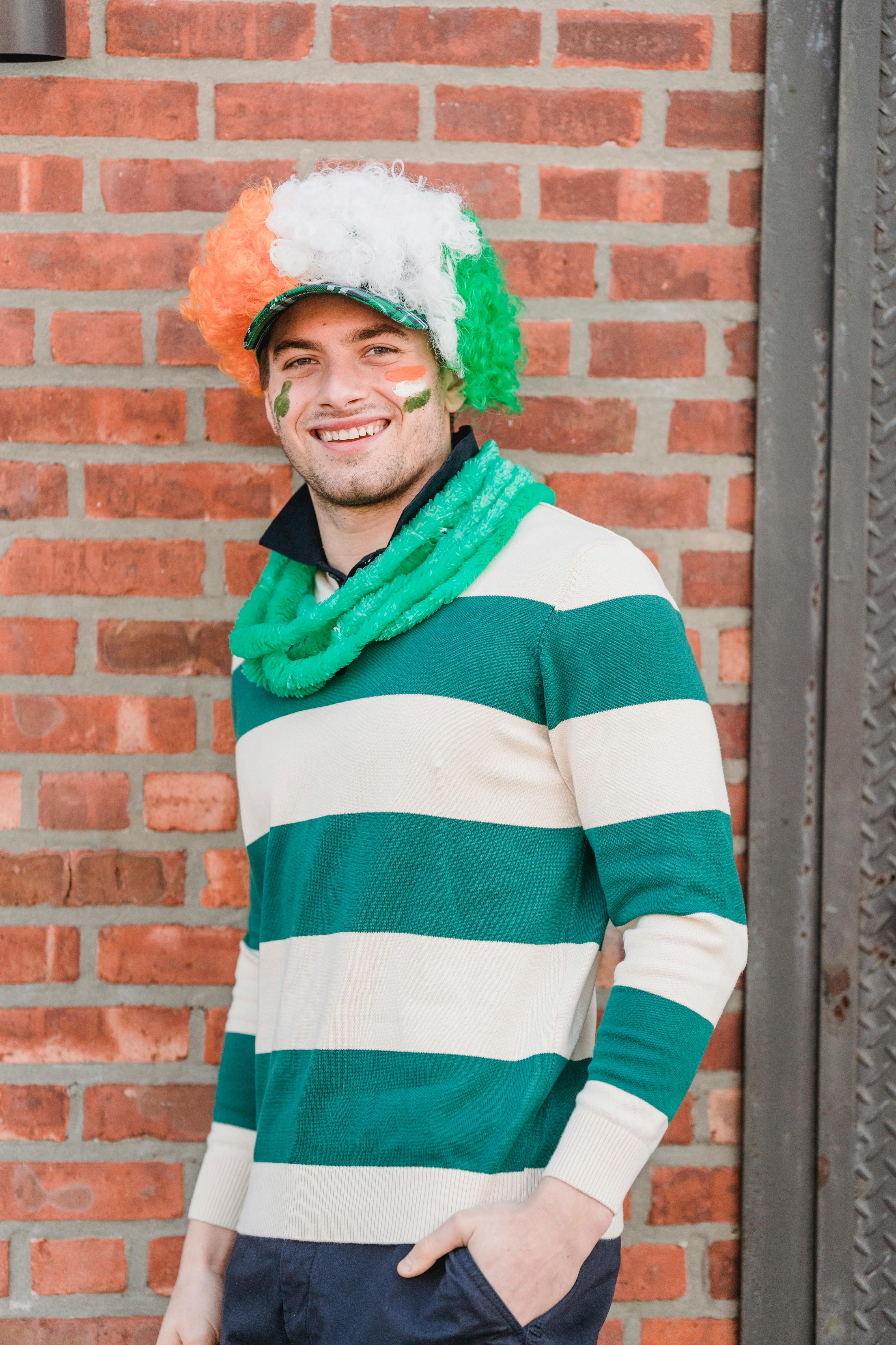 cheerful man on street during saint patricks day