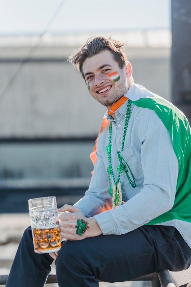 Young Smiling Guy With Mug Of Beer Celebrating Feast Of St Patrick