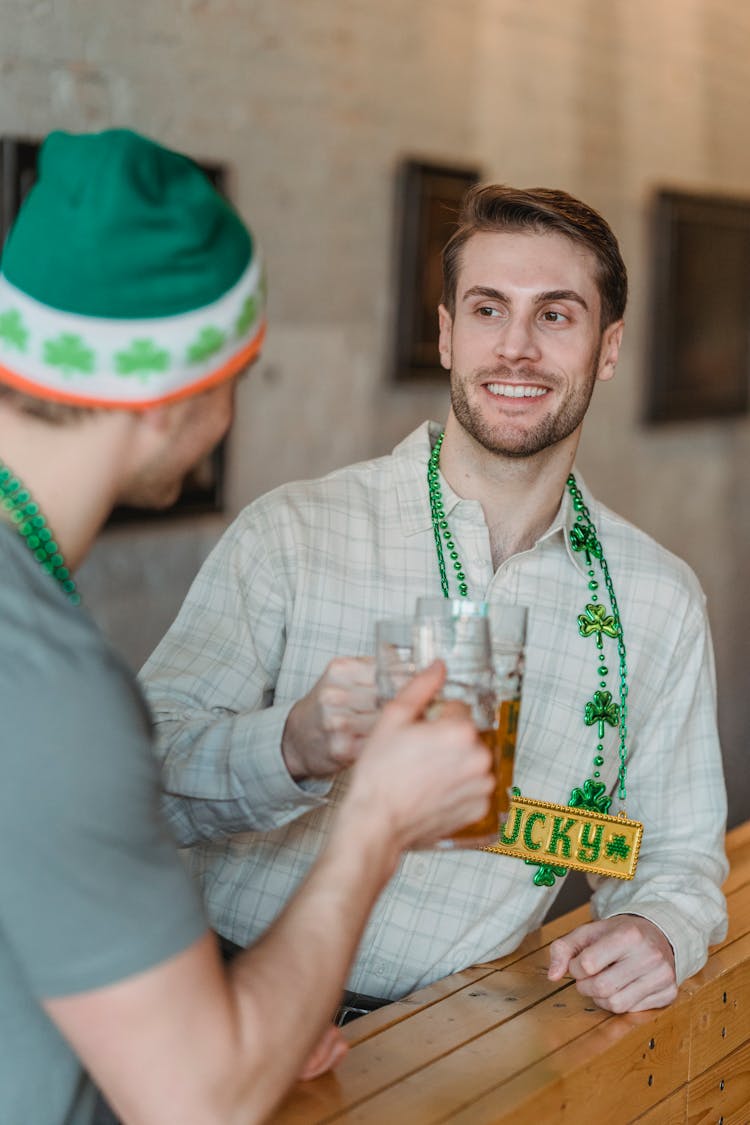 Cheerful Football Fan In National Symbols Celebrating With Friend