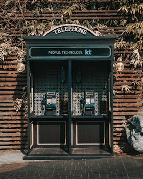 Classic telephone booths in Seoul showcasing vintage design and technology.