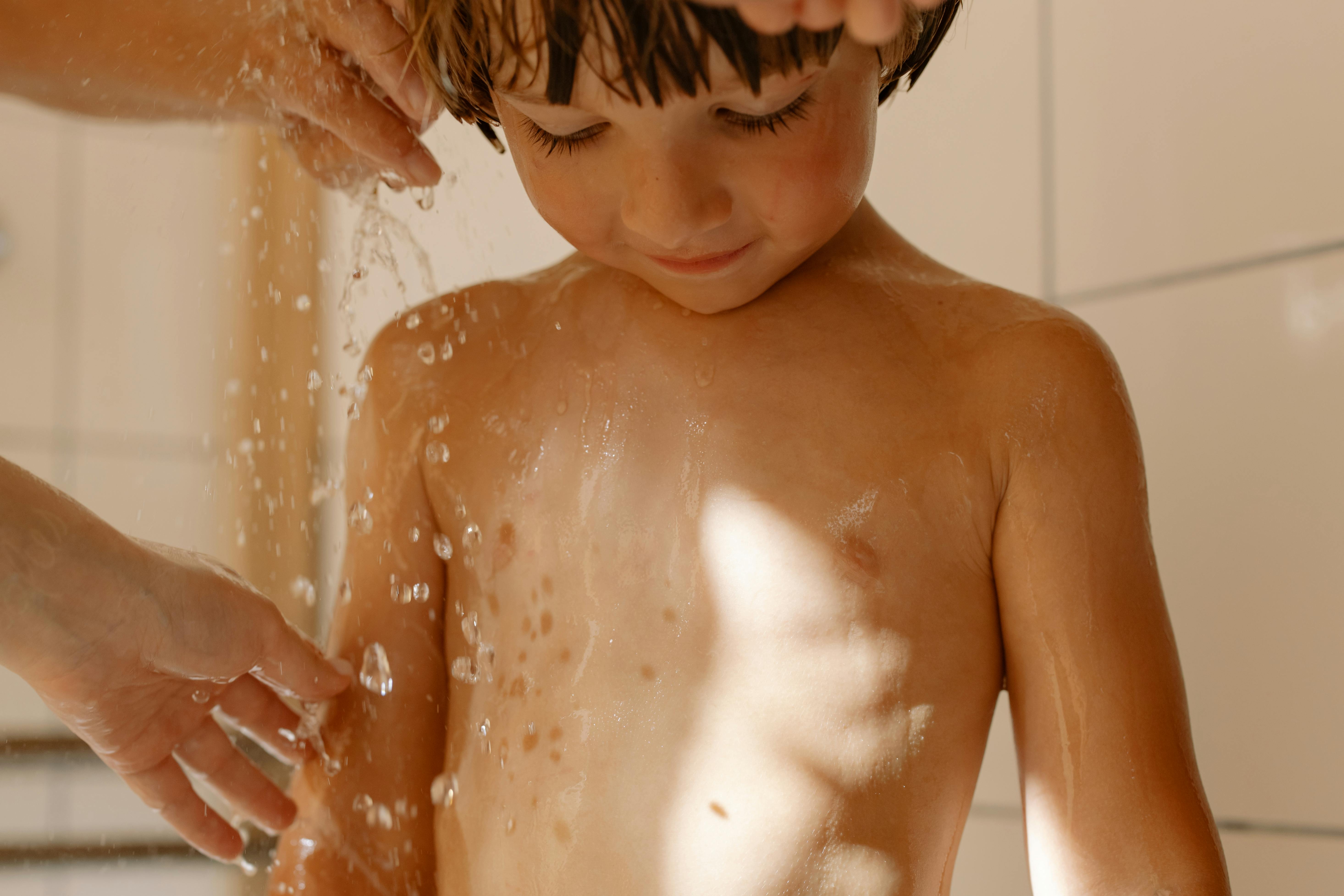 photo of a child bathing