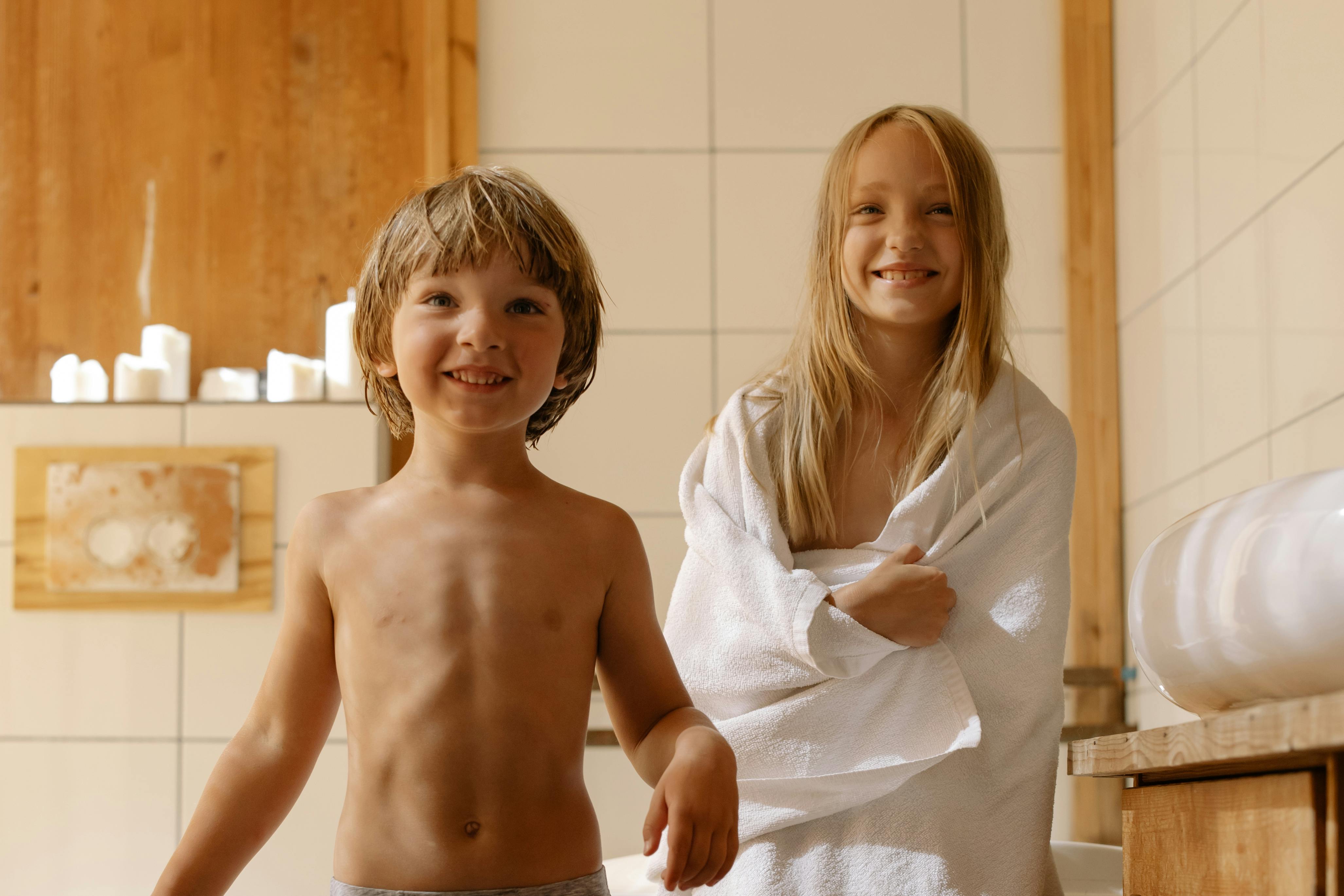 siblings in a bathroom