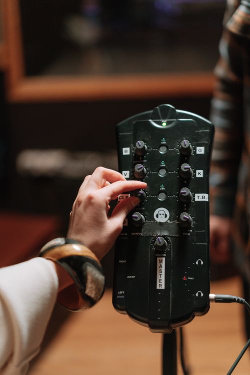 A Hand on an Audio Equipment · Free Stock Photo