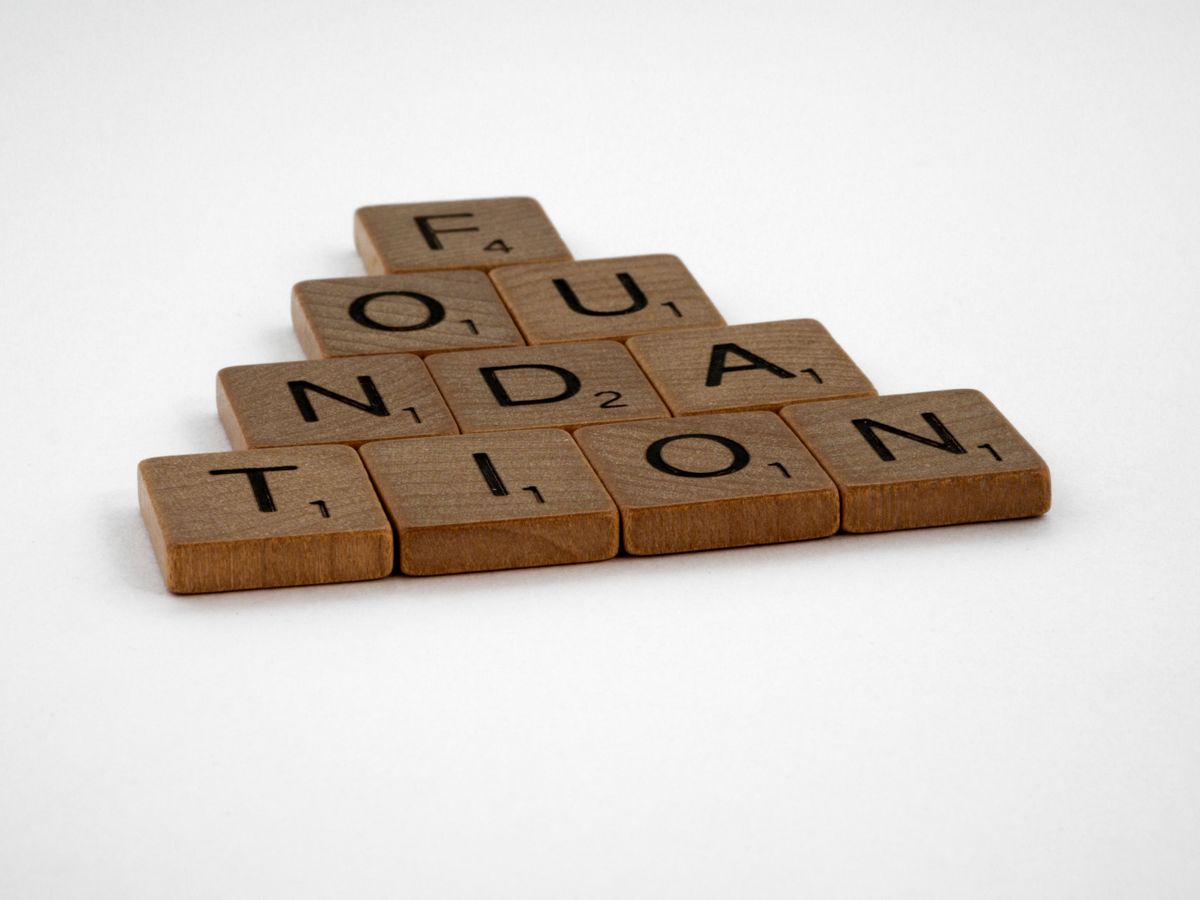 Building blocks arranged to show foundational structure