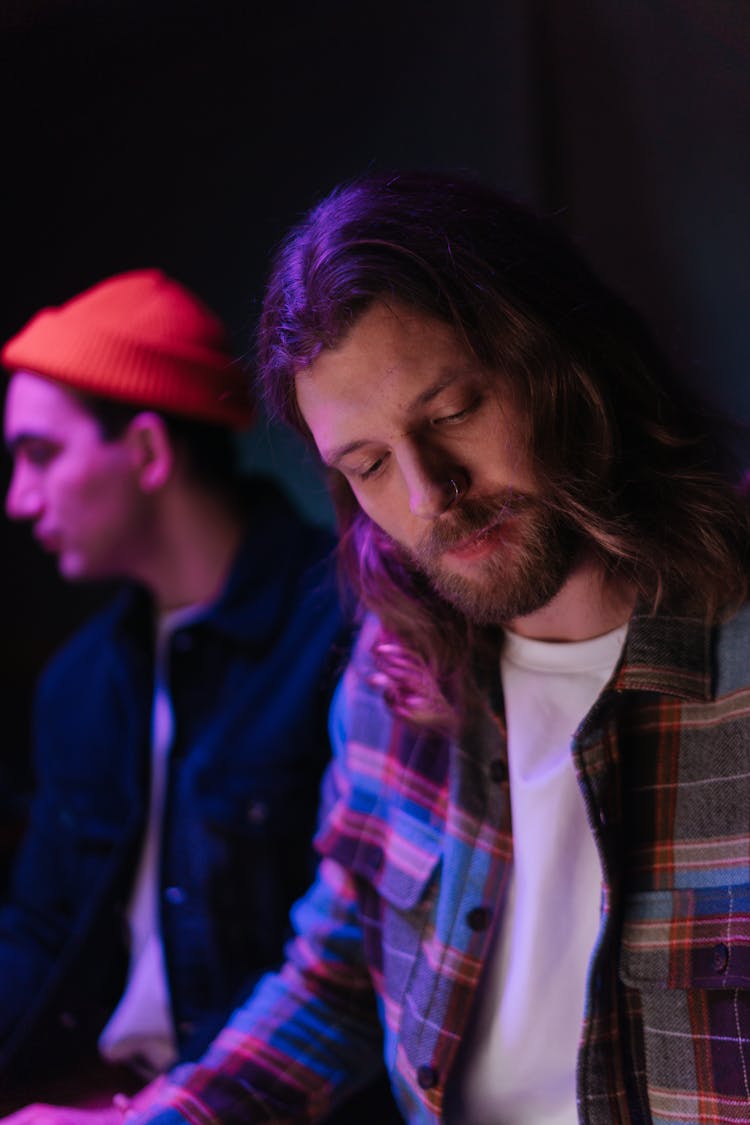 Man In Brown And Blue Plaid Long Sleeve Shirt