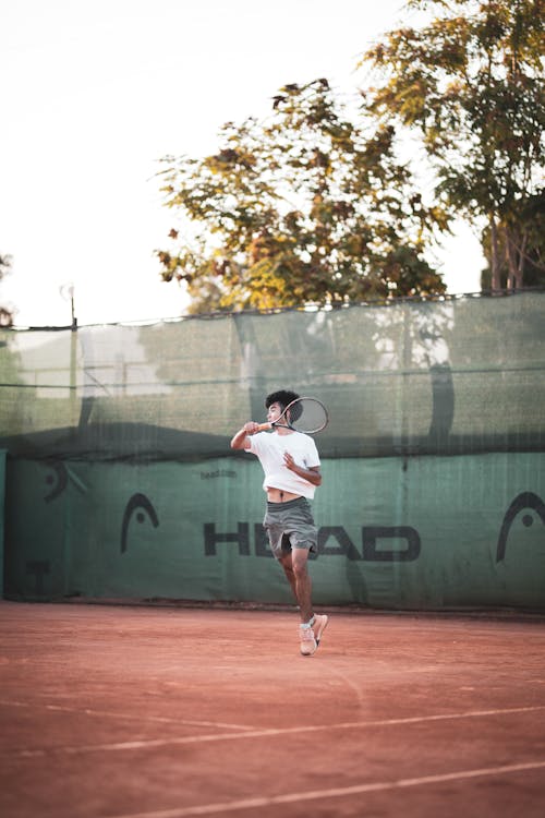 A Man Playing Tennis 