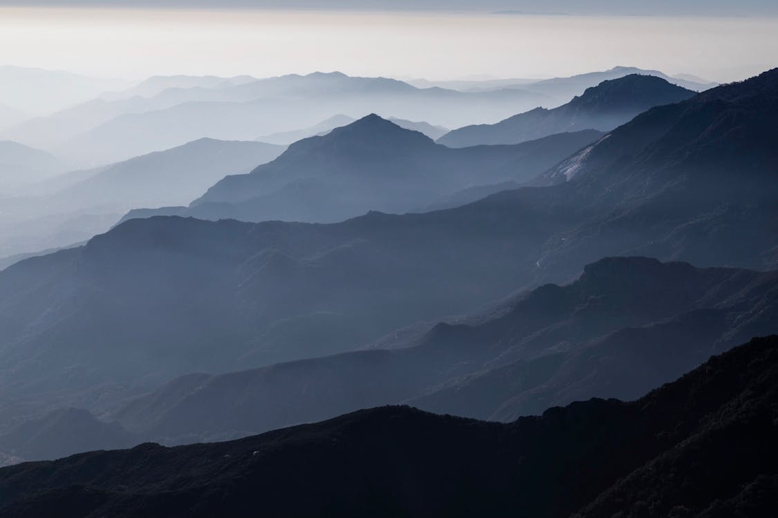 Black And White Mountains Under White Sky · Free Stock Photo