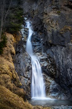 Long exposure of a cascading waterfall in the Auvergne-Rhône-Alpes region.