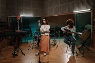 A Band Rehearsing Inside the Studio