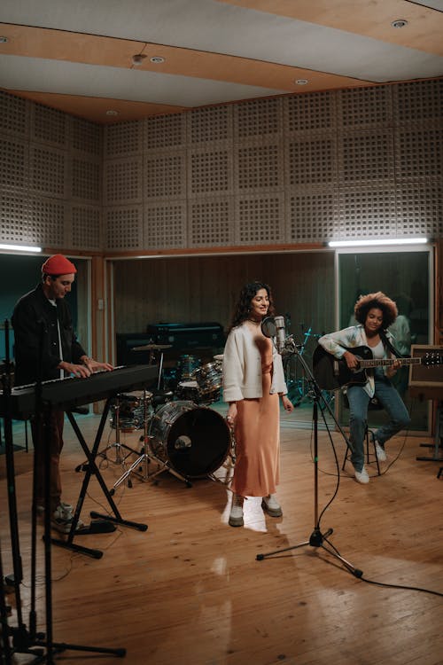 A Band Rehearsing Inside the Studio