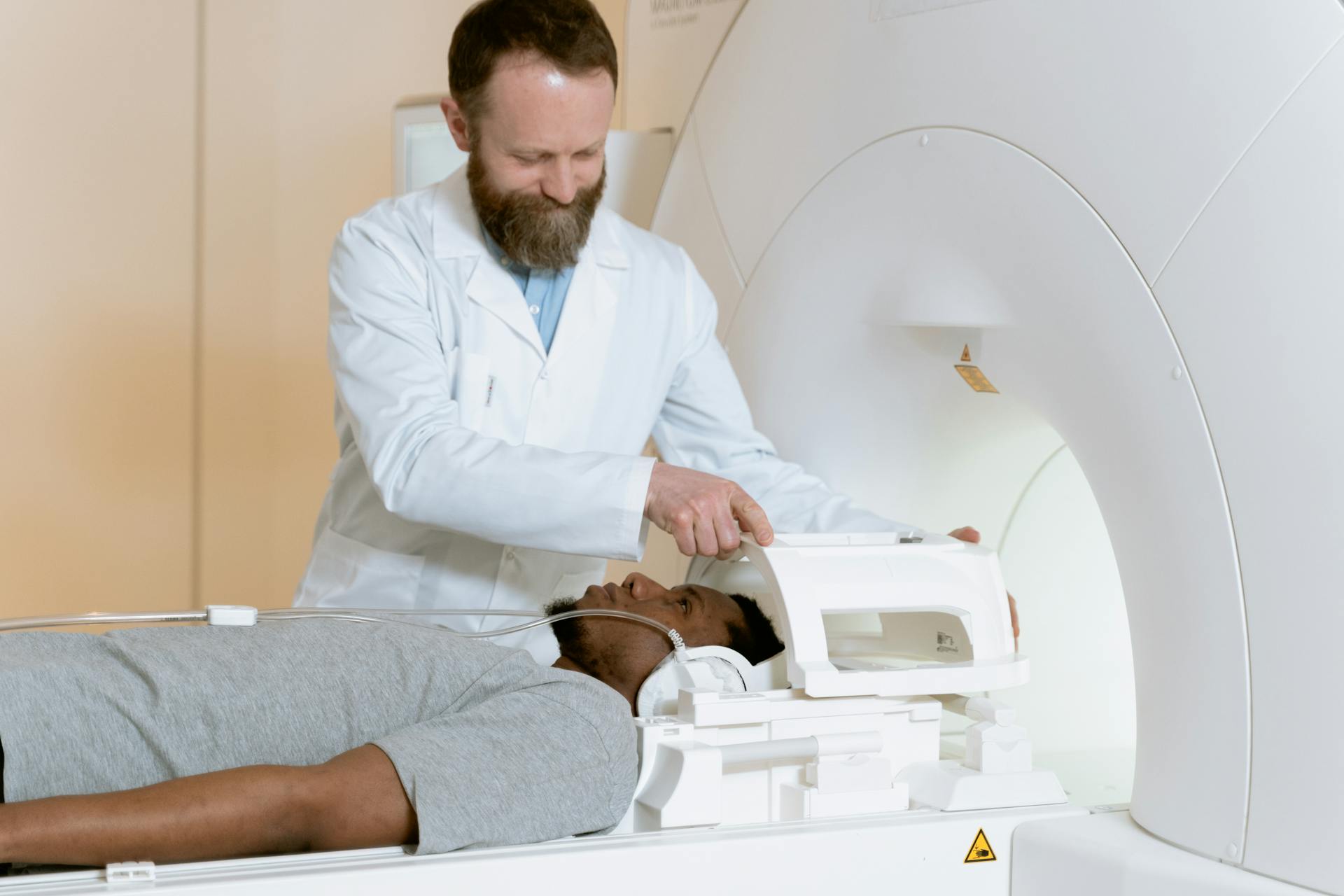 Photo Of Doctor Examining Patient