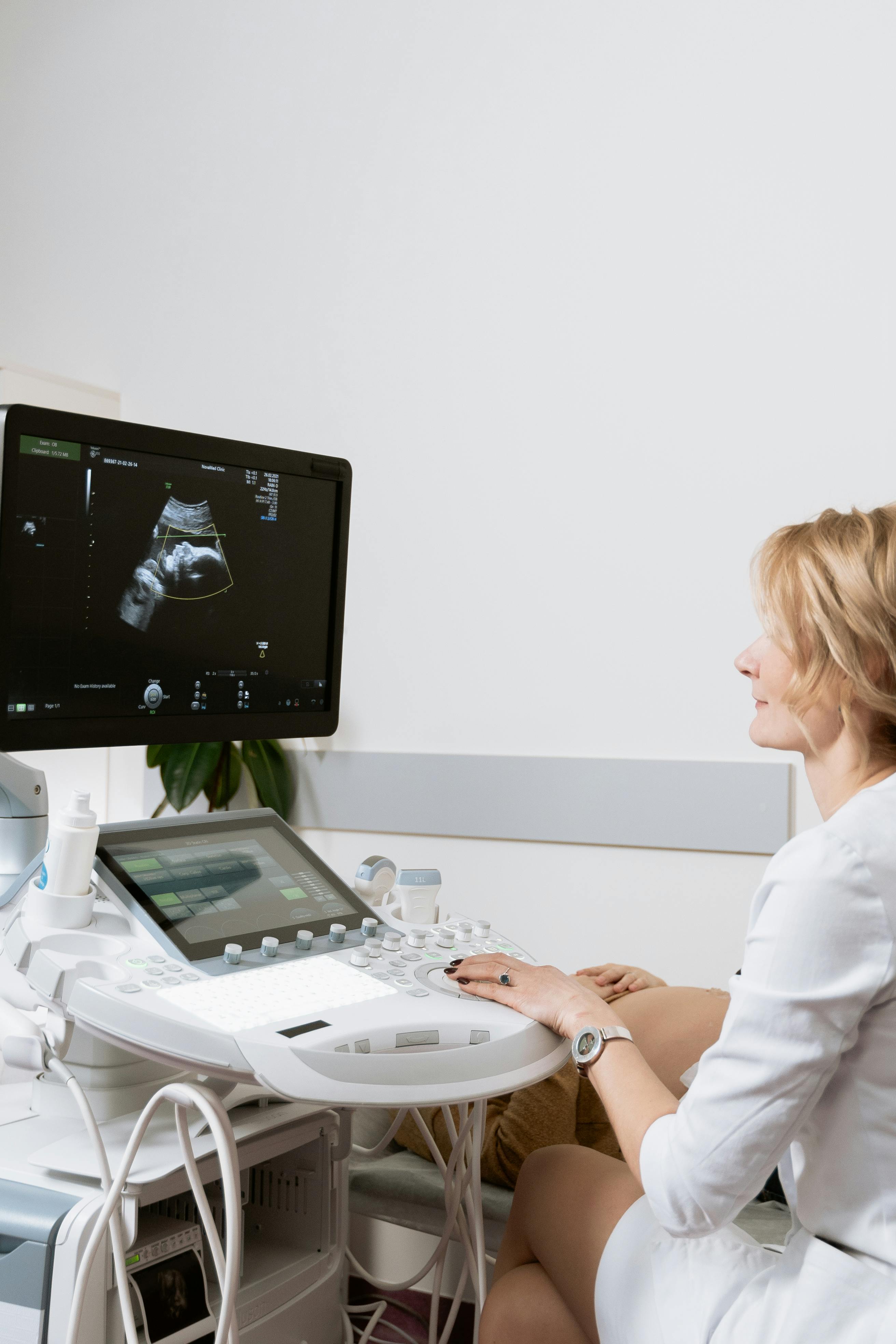 photo of woman looking on a monitor