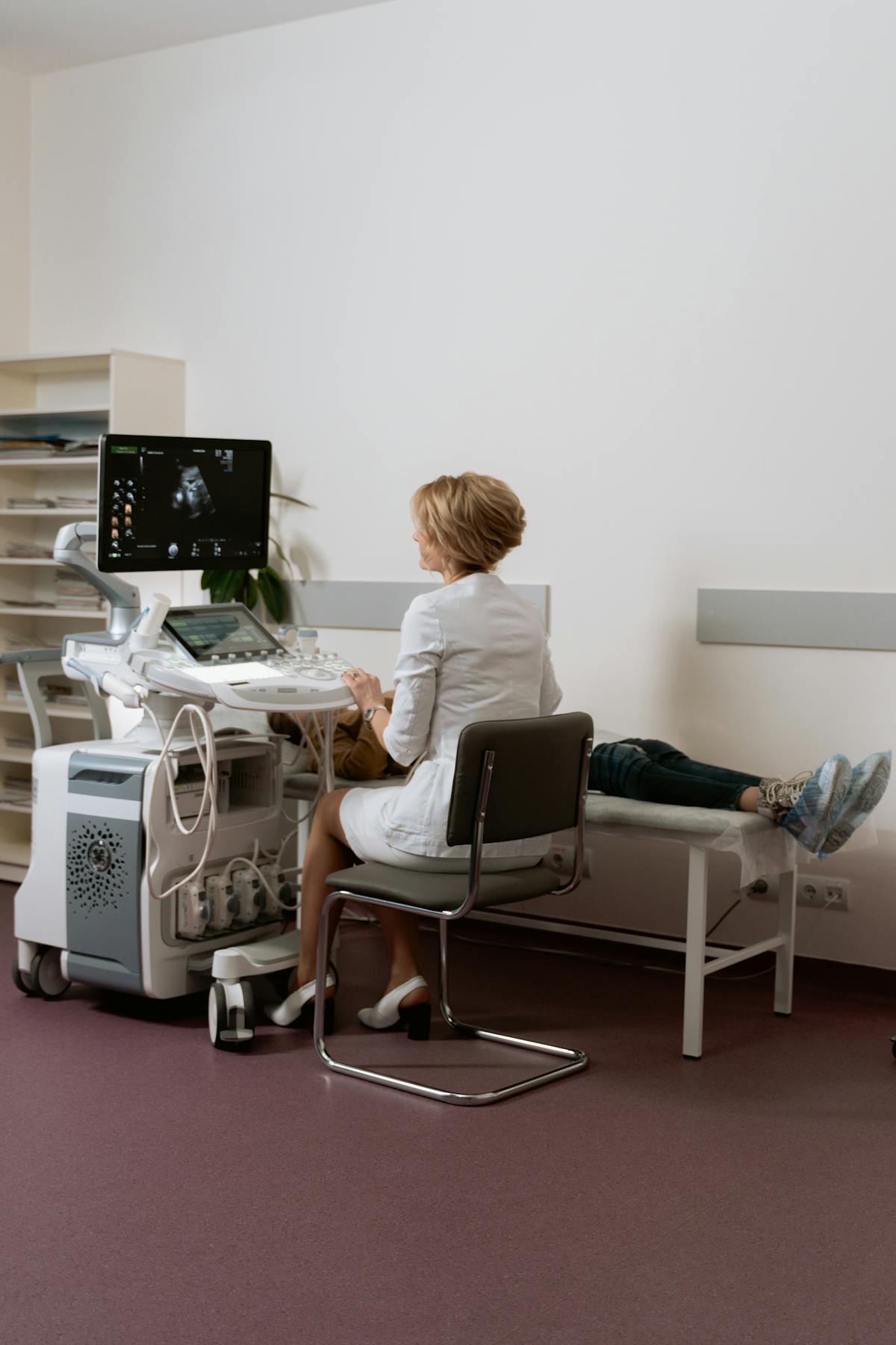 Pregnant woman consulting with a doctor
