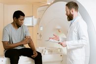 Photo Of Doctor Talking To Patient
