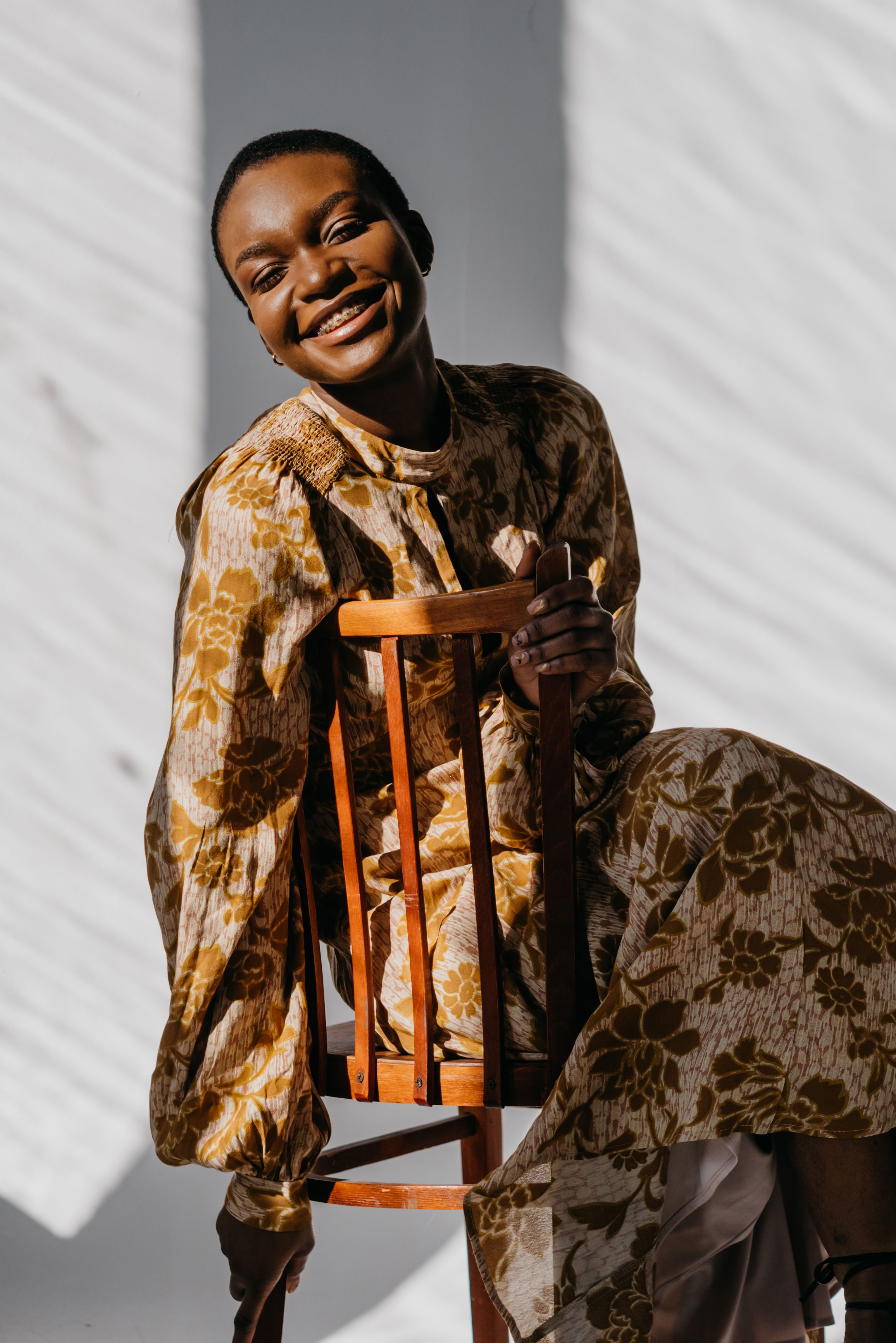 Woman in Yellow Dress Sitting on a Chair · Free Stock Photo