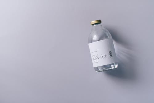 Free Close-Up Shot of a Bottle of Liquid Stock Photo