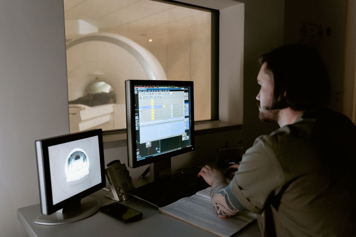 Best Paramedical Institute Near Chirag Delhi - radiologist reviewing X-ray scan results