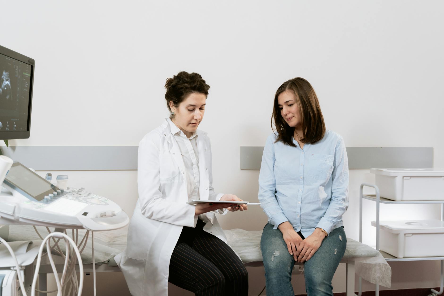 Pregnant Woman Having A Consultation