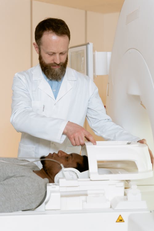 Photo Of Medical Practitioner Doing Test