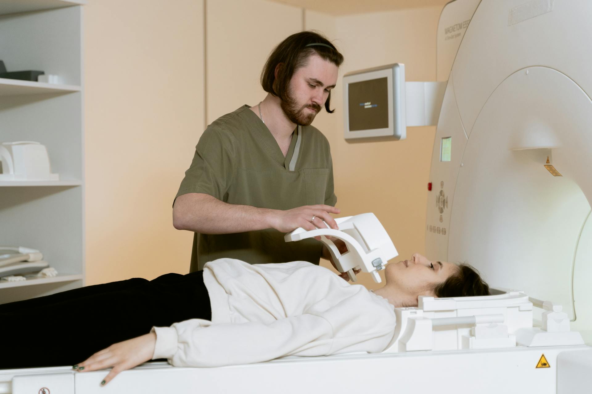 Photo Of Medical Worker Doing A Test On Patient