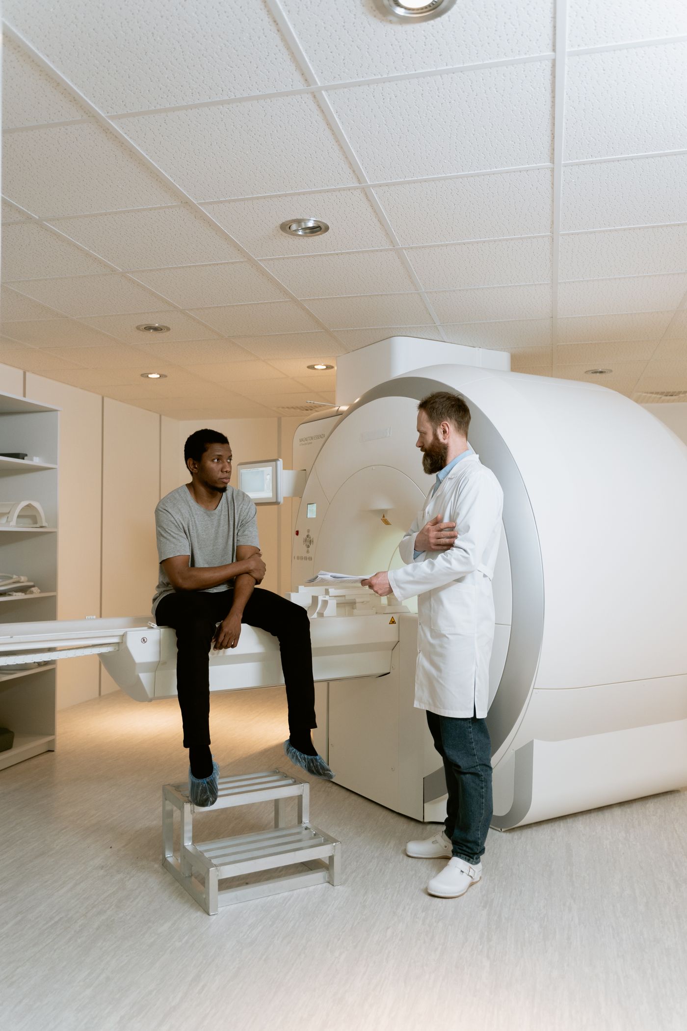Doctor and patient reviewing medical imaging in a hospital
