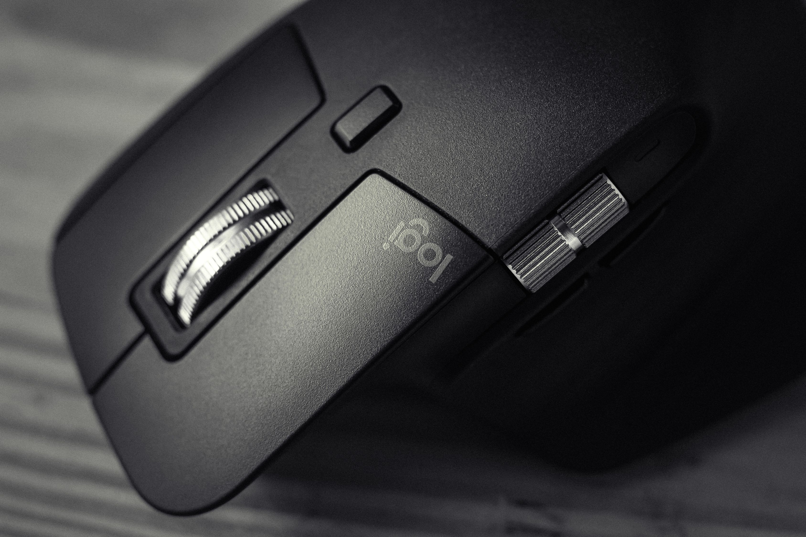 Contemporary wireless game computer mouse on table · Free Stock Photo