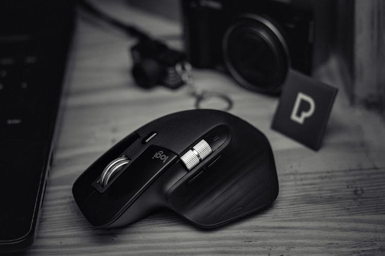 Contemporary Computer Game Mouse Near Photo Camera