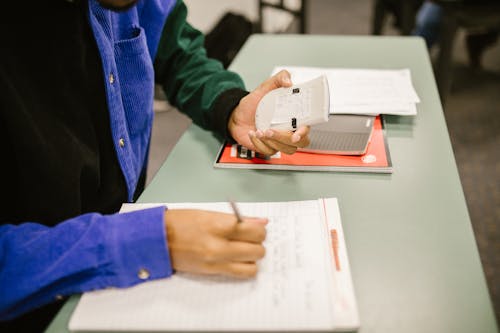 Free Student Cheating During an Exam Stock Photo