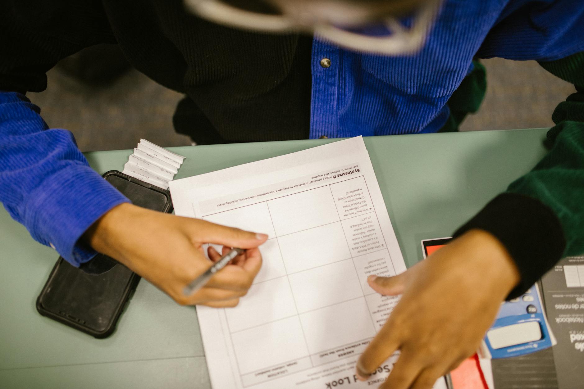 https://www.pexels.com/photo/student-cheating-during-an-exam-7092454/