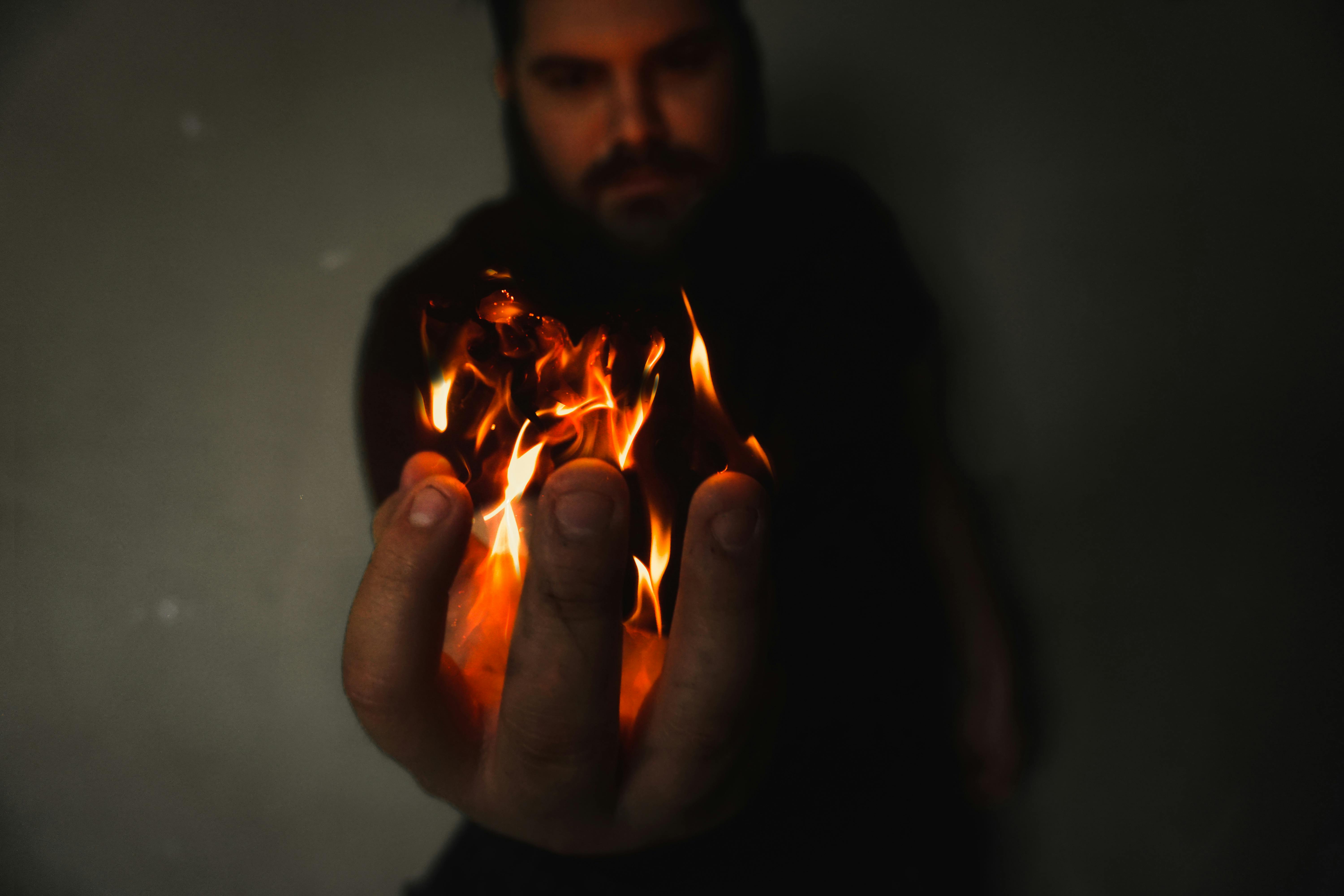 Person documenting a digital privacy checklist in a notebook beside a laptop