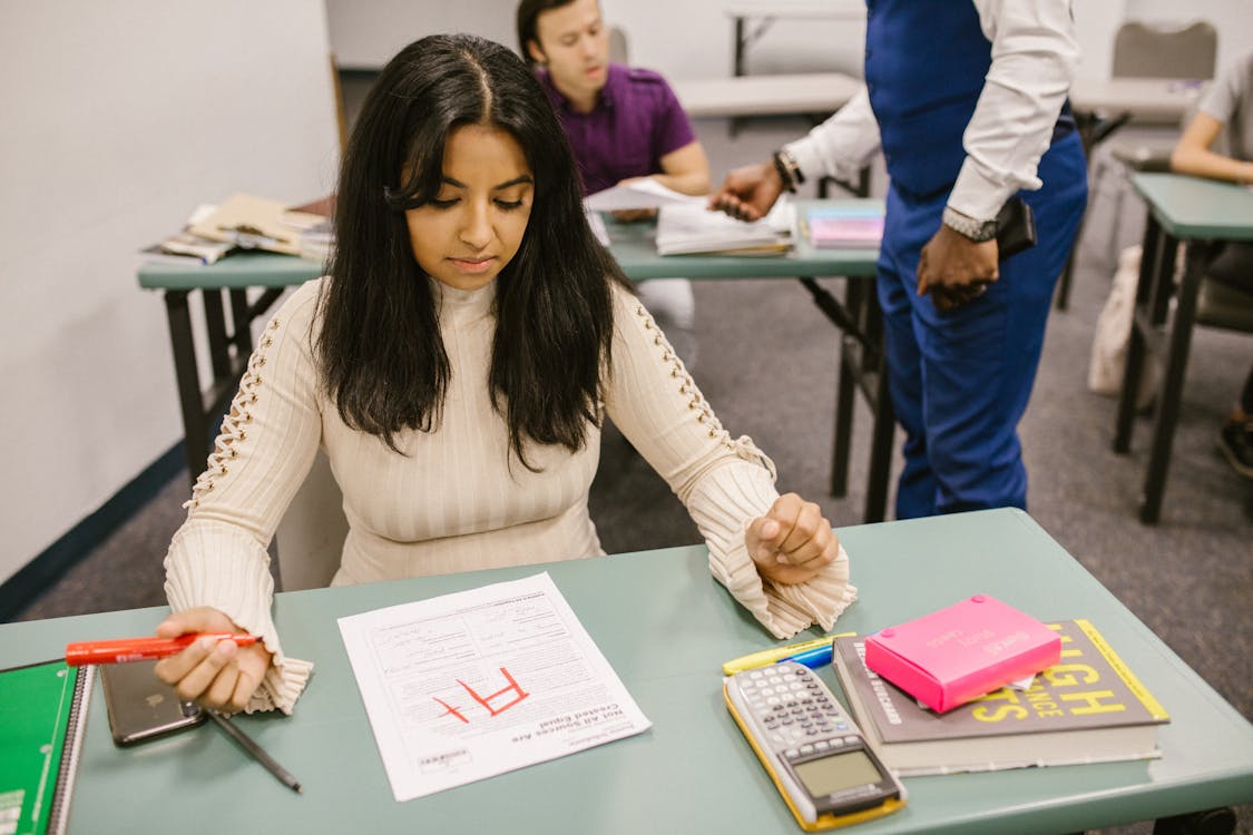 Free Student Getting A+ Mark in Her Exam Stock Photo