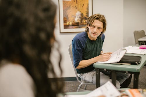 Free Students Cheating During an Exam Stock Photo