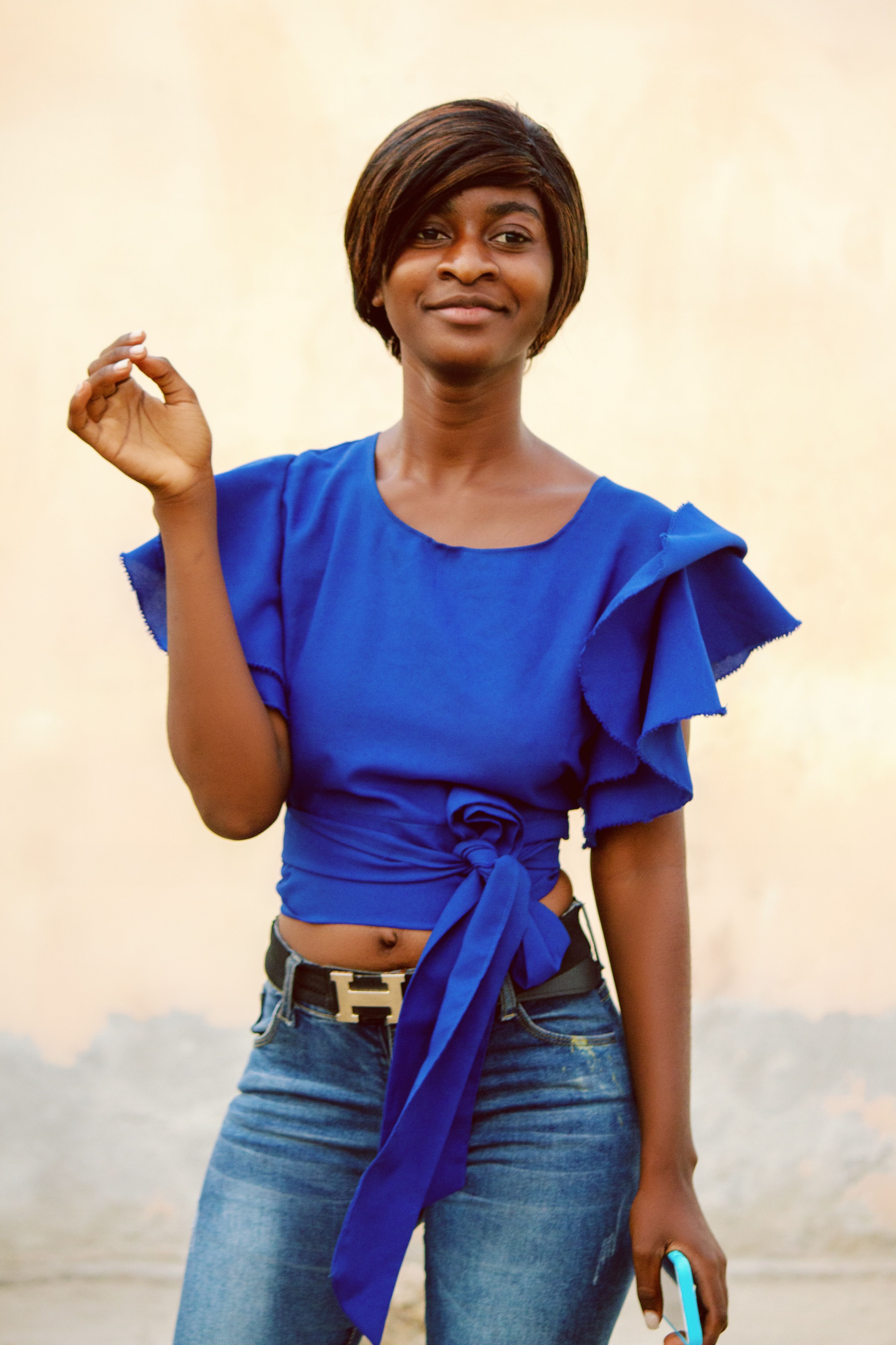 Woman in Blue Top and Blue Denim Pants · Free Stock Photo