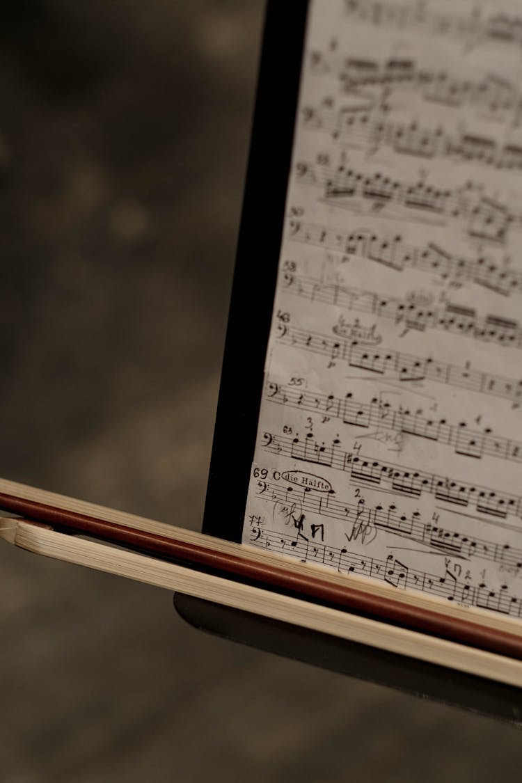 Musical Notes On Brown Wooden Frame