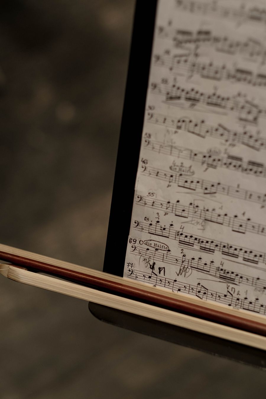 Sheet music with a violin bow