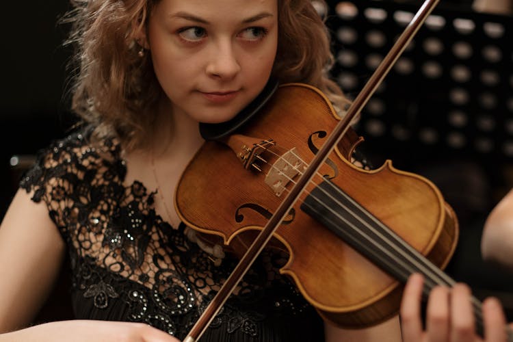 A Woman Playing Violin