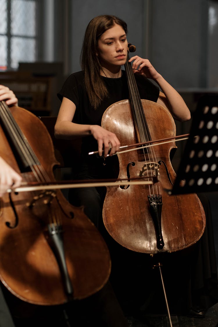 A Woman Playing A Cello