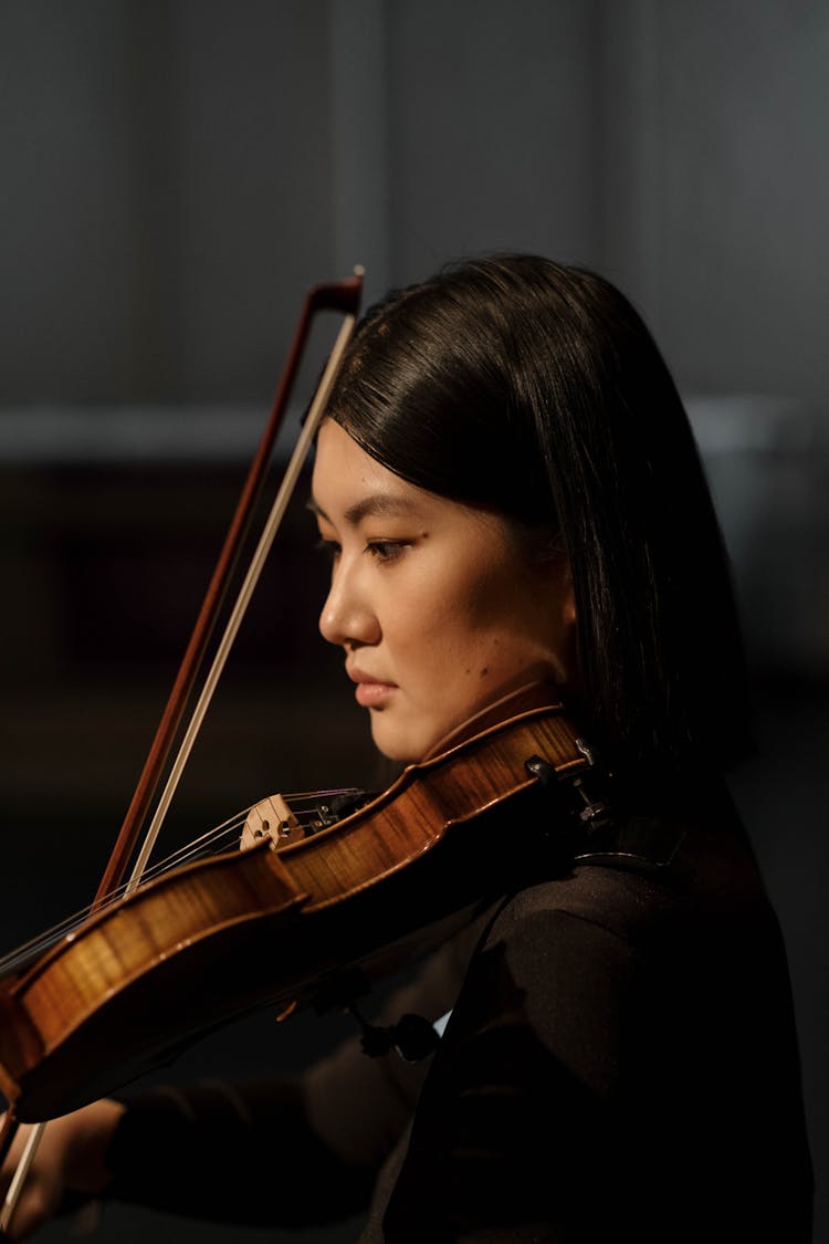 A Woman Playing Violin