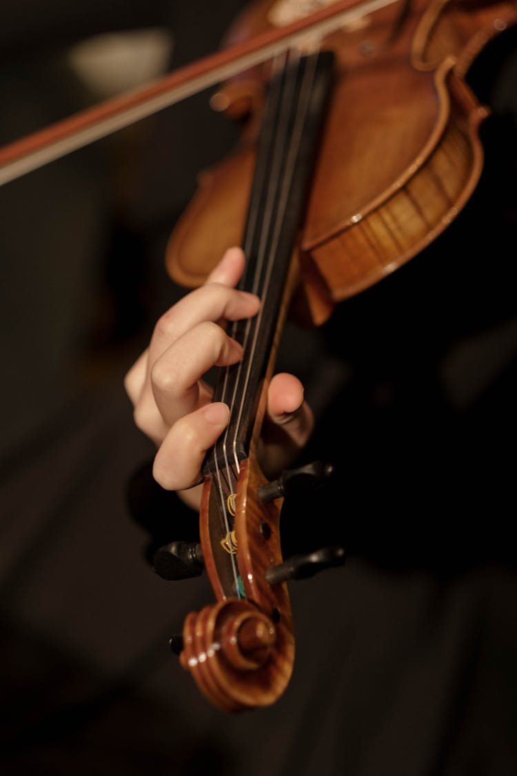  A Person Playing Violin Using Fingers