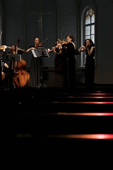 Group of women musicians performing classical music in a church setting.