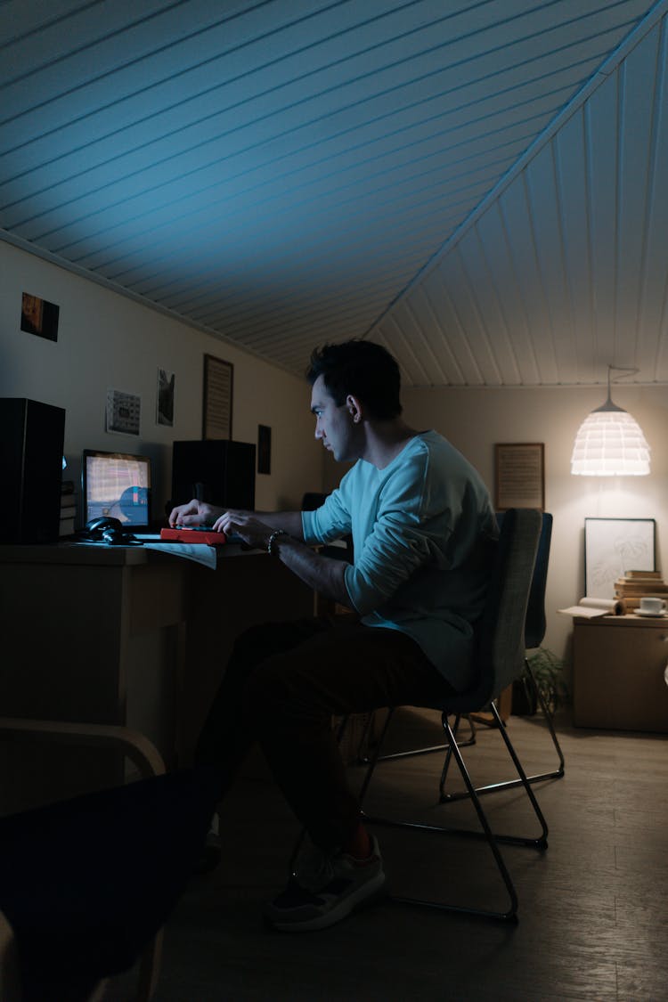 A Man Working At Home 