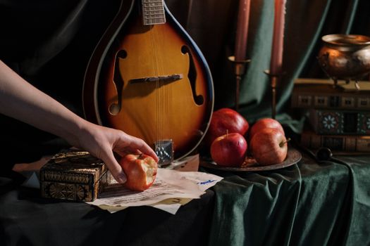 Person Holding Bitten Apple