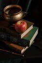 Goblet and Apple on Books