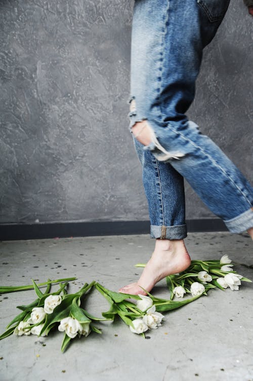 Free Person in Blue Ripped Jeans Stock Photo