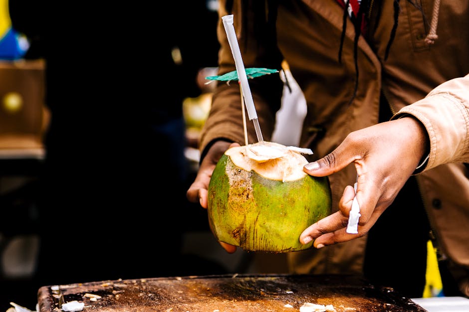 Person Holding Coconut
