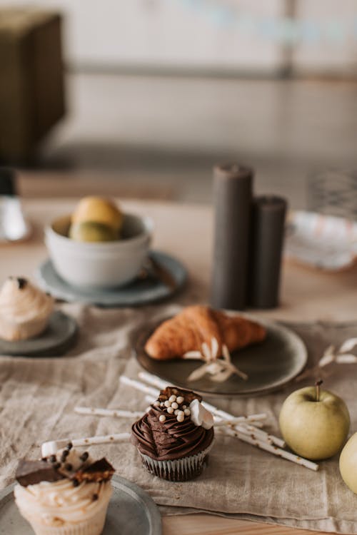 Free Green Apples and Cupcakes on the Table Stock Photo