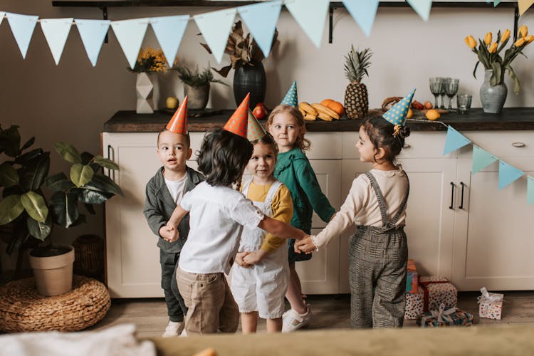 Children Wearing Party Hats